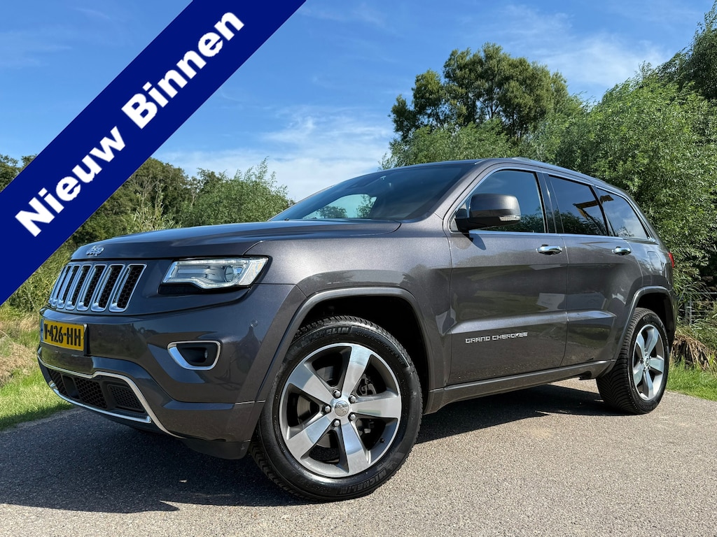 Jeep Grand Cherokee 3.0 CRD Overland Automaat / Grijs Kenteken / Panoramadak / Leder / Camera / Navi / Clima / Trekhaak / Cruise /