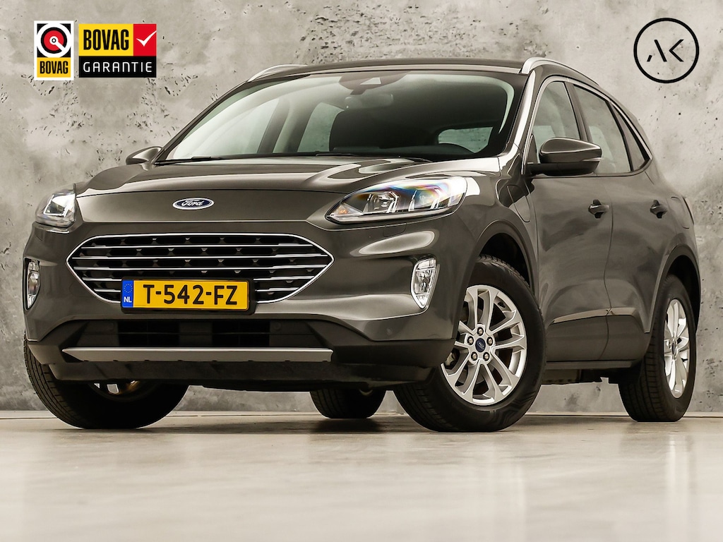 Ford Kuga 2.5 PHEV Titanium X 225Pk Automaat (SOH 87,6%, VIRTUAL COCKPIT, APPLE CARPLAY, STUUR/STOELVERWARMING, KEYLESS, SPORTSTOELEN, CAMERA, TREKHAAK, NIEUWSTAAT)