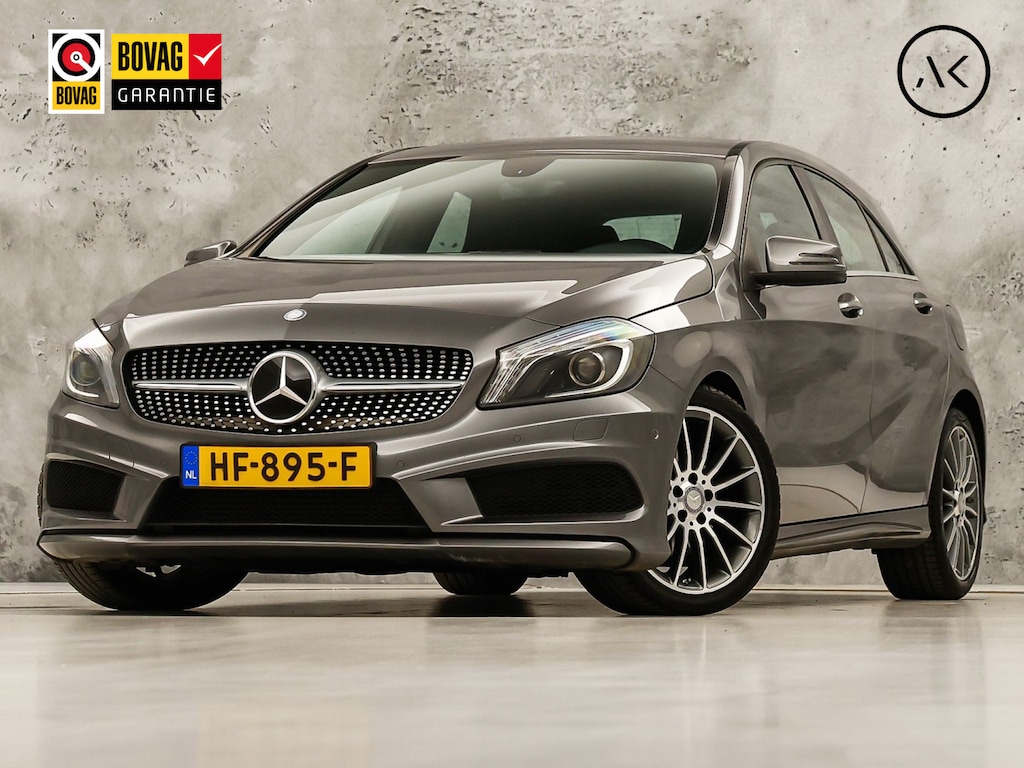 Mercedes-Benz A-klasse 180 AMG Sport (NAVIGATIE, LEDER/ALCANTARA, DIAMOND GRILL, SPORTSTOELEN, XENON, CRUISE, NIEUWE APK, NIEUWSSTAAT)
