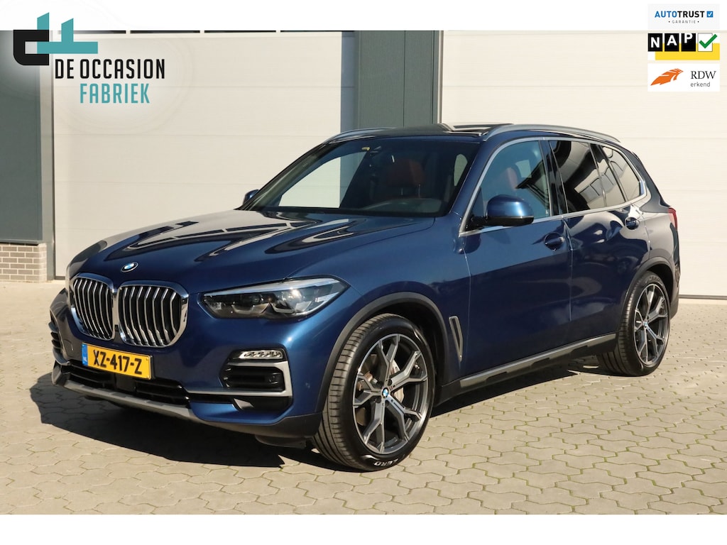 BMW X5 XDrive40i High Executive Luchtvering 4-wielsturing Pano Trekhaak Carplay Harman Kardon