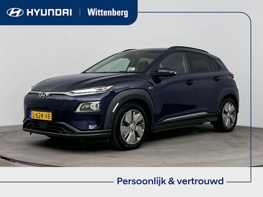 Hyundai Kona Electric EV Premium 64 kWh | SOH 96,5 | Lederen bekleding | Stoel Verwarming / Verkoeling | Parkeersensoren | Dodehoek detectie |