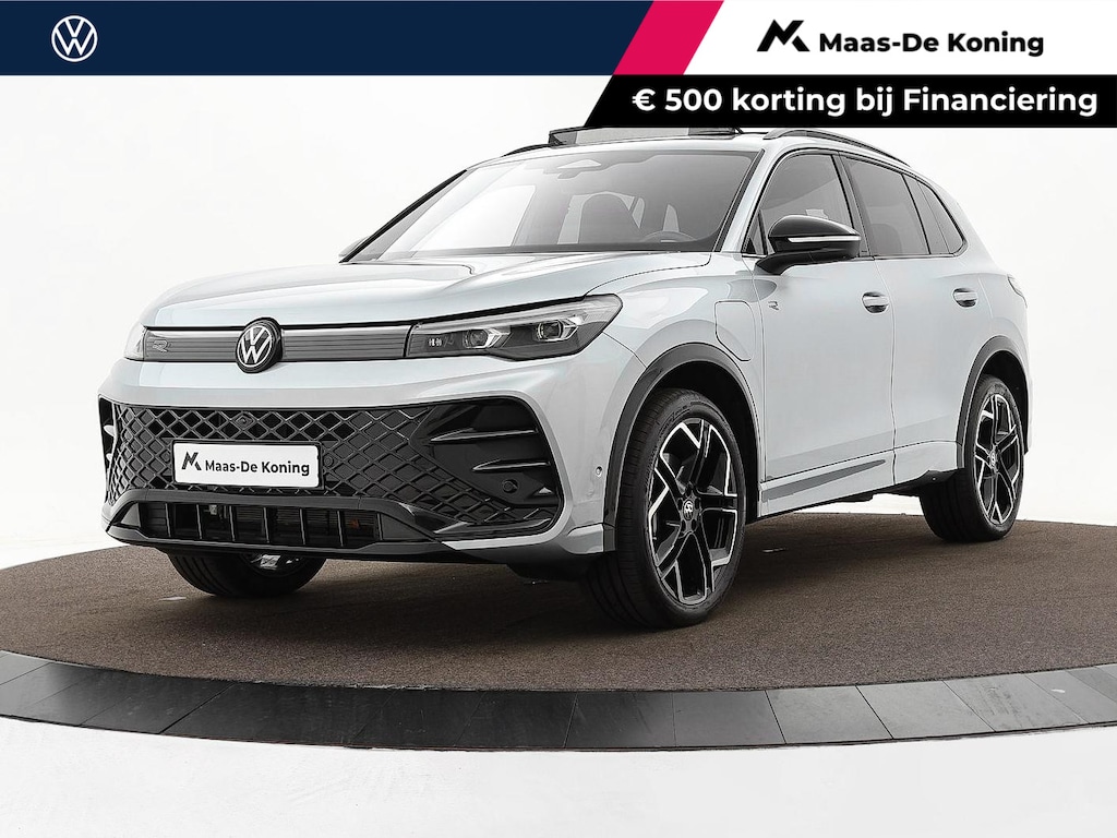 Volkswagen Tiguan 1.5 eHybrid 204pk DSG R-Line Edition · Panoramadak · 360 Camera · Inklap. Trekhaak · Matrix LED · Stuur- & Stoelverwarming + Massage · Achterbank verwarmd · Garantie t/m 09-10-2030 of 100.000km