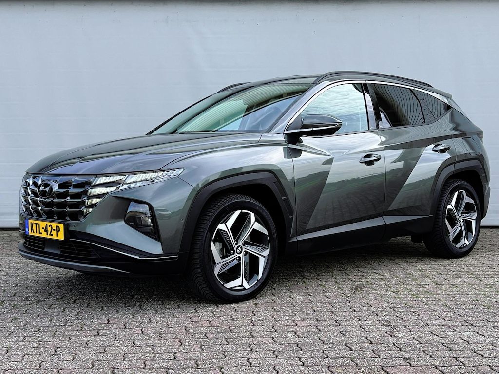 Hyundai Tucson 1.6 T-GDI PHEV | Premium | SOH 100% | 4WD | Leder | Trekhaak