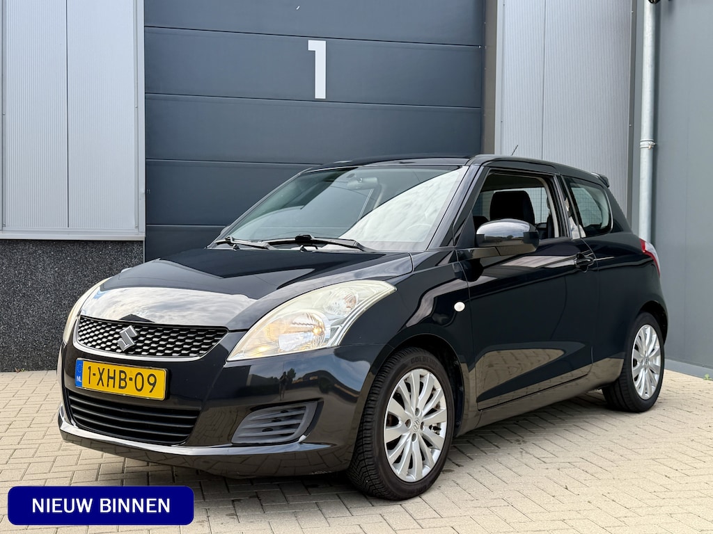 Suzuki Swift 1.2 Bandit EASSS *Origneel NL!* Stoelverwarming / Navigatie / Cruise Control / Airco / 16"LMV