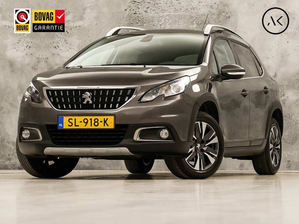 Peugeot 2008 1.2 PureTech Allure Sport (APPLE CARPLAY, NAVIGATIE, CAMERA, CLIMATE, SPORTSTOELEN, LEDER, GETINT GLAS, CRUISE, TREKHAAK, NIEUWSTAAT)