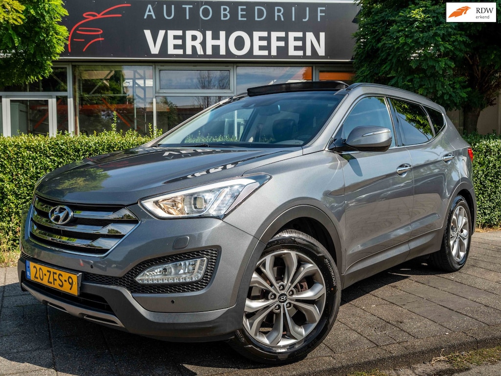 Hyundai Santa Fe 2.4i GDI 4WD i-Catcher 7p. - AUTOMAAT - PANORAMADAK - PARK CAMERA - STOEL VERW - LEDER ZWART !