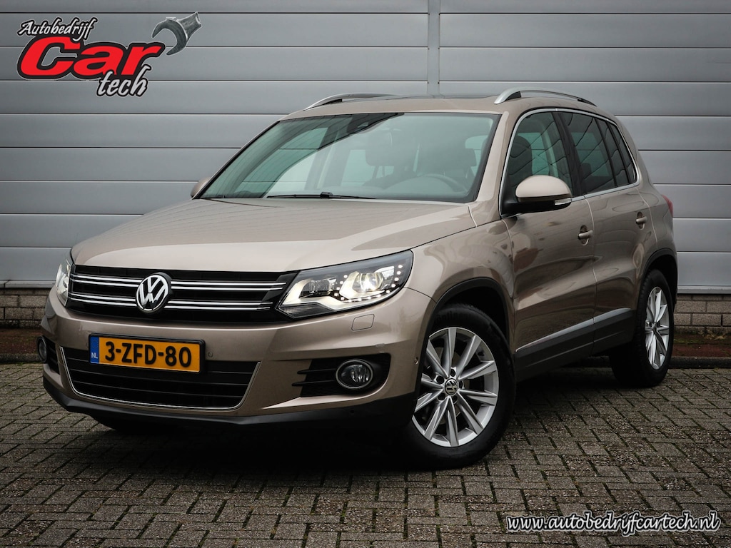 Volkswagen Tiguan 1.4 TSI Sport&Style | Clima | Cruise | Navi | Leer | Panoramadak | Trekhaak | Xenon | Pdc voor/achter | Camera |  Allseason