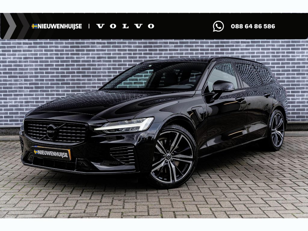 Volvo V60 2.0 T6 Recharge AWD R-Design | Plug-in Hybrid (PHEV) | Trekhaak | Harman Kardon Audio | Achteruitrijcamera | Parkeersensoren | Keyless Entry | Elektrische Achterklep | Elektrisch Verstelbare Voorstoelen | Stoelverwarming | LED Koplampen Adaptief | Navigatie | Apple Carplay | Android Auto