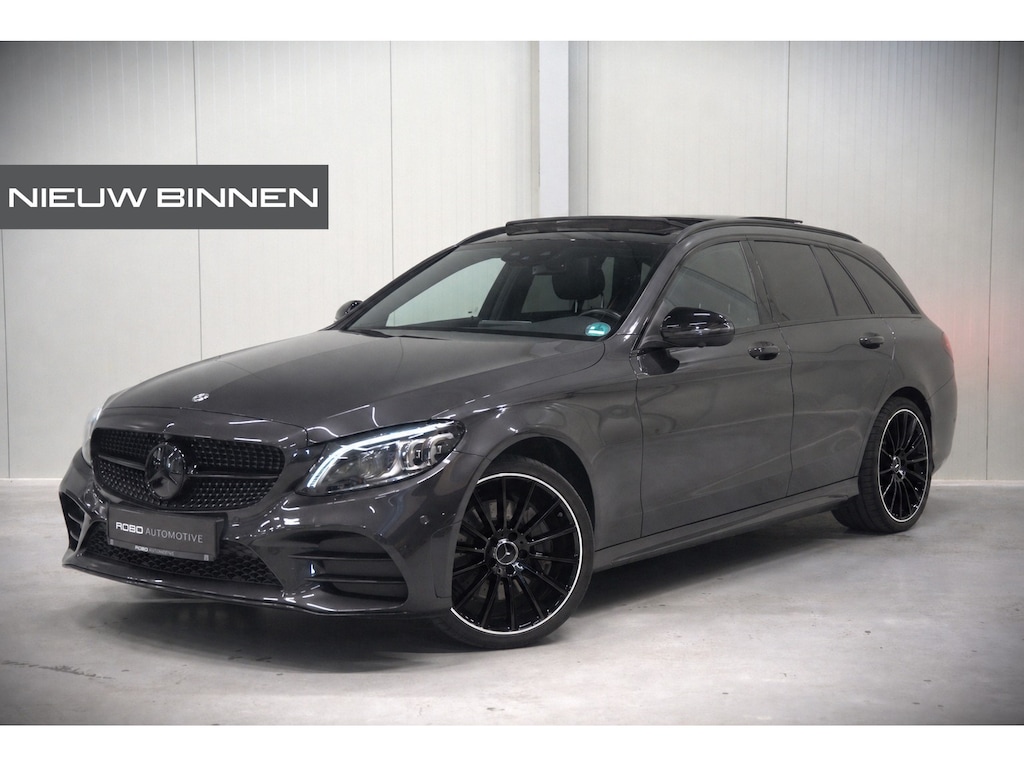 Mercedes-Benz C-klasse Estate 300 e Business Solution AMG | Panoramadak | Stoelverwarming | 360 Camera | Dodehoekdetectie | Cruise Control | Apple Carplay | Navigatie | Trekhaak | DAB | Ambiance Verlichting | Multibeam