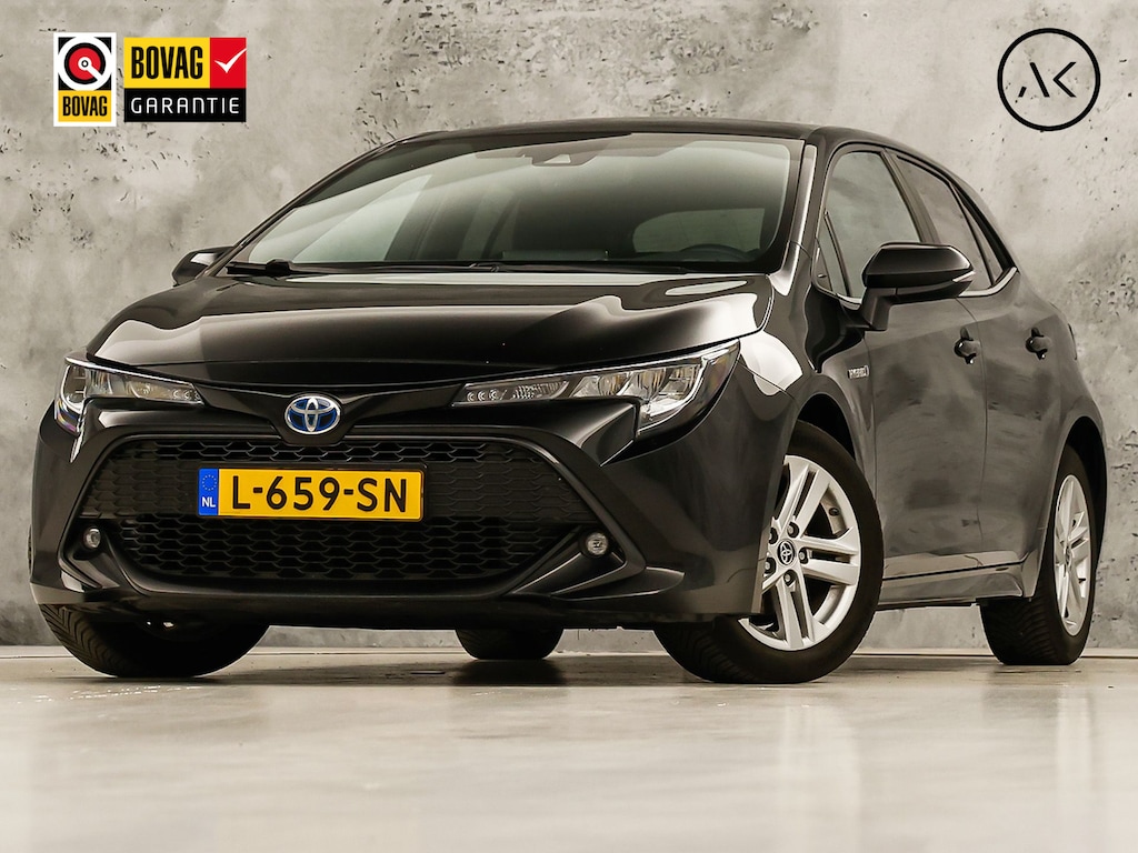 Toyota Corolla 1.8 Hybrid Sport Automaat (VIRTUAL COCKPIT, APPLE CARPLAY, CAMERA, STUUR/STOELVERWARMING, SPORTSTOELEN, ADAPTIVE CRUISE, ZWART HEMEL, NIEUWE APK, NIEUWSTAAT)