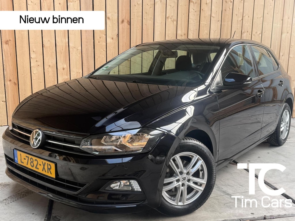 Volkswagen Polo 1.0 TSI Comfortline Business Achteruitrijcamera | Adaptieve cruise control | Apple CarPlay/Android Auto | Climate control | Lichtmetalen velgen | Navigatiesysteem | Parkeersensoren voor en achter
