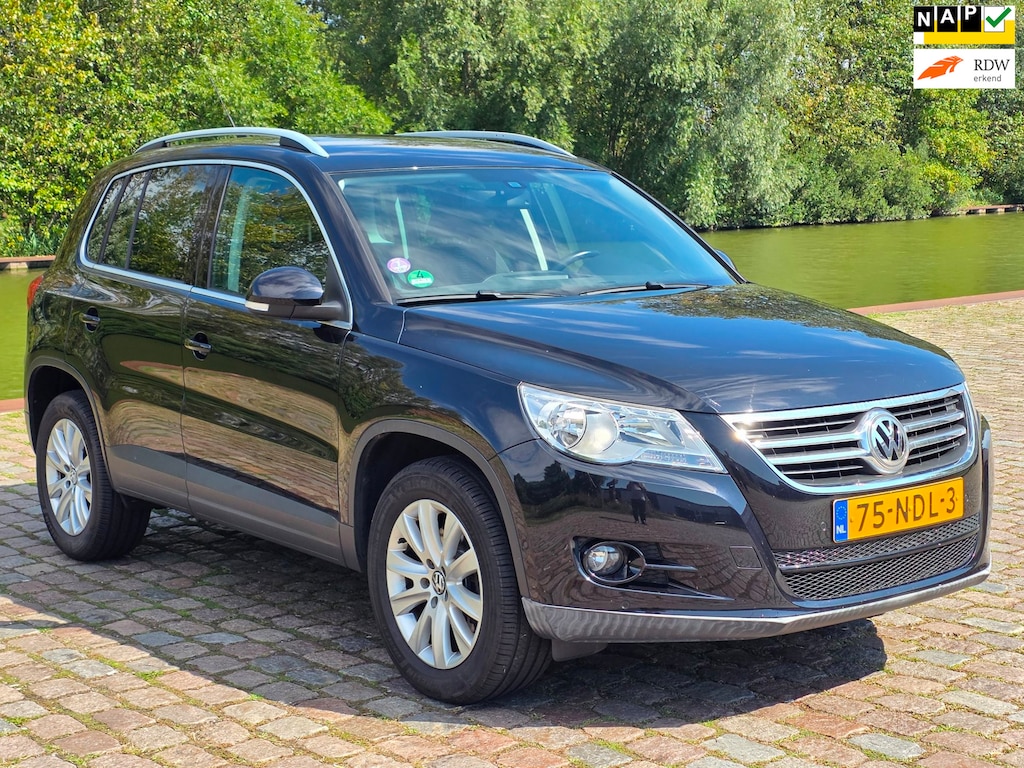 Volkswagen Tiguan 1.4 TSI Sport&Style 1e eigenaar dealer onderhouden navigatie cruis control parkeer sensor trekhaak