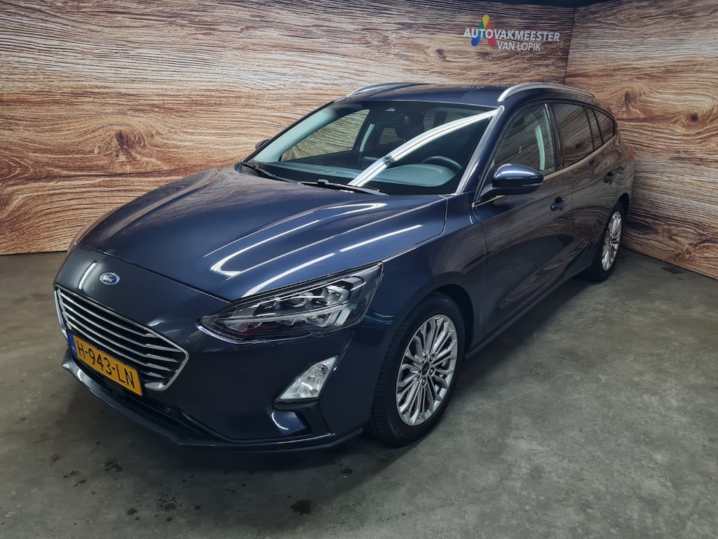 Ford Focus Wagon 1.0125pk Titanium Business Winterpack All-in prijs + 12 mnd garantie.