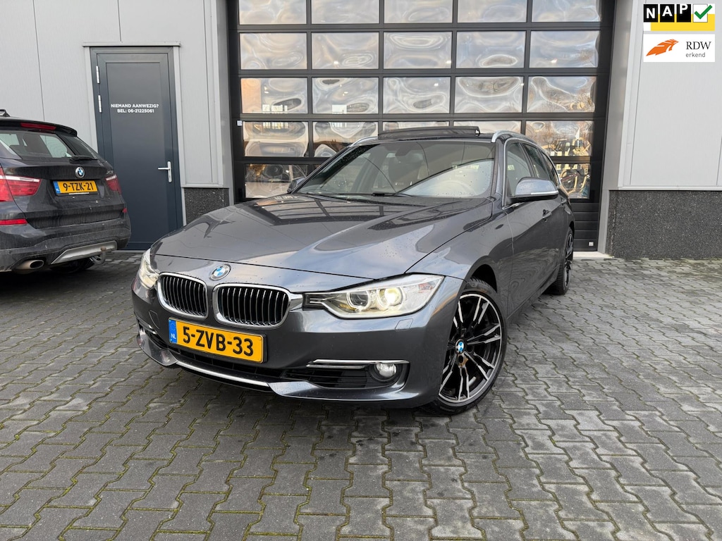 BMW 3-Serie Touring 328i High Executive Panoramadak sportstoelen 245 PK
