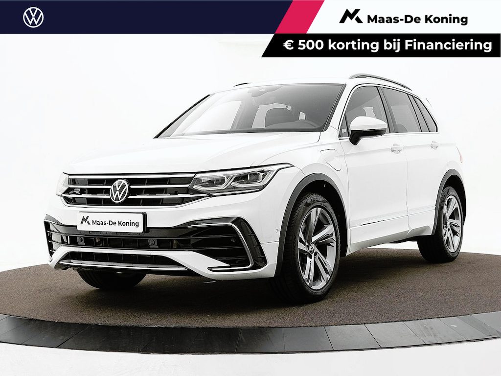 Volkswagen Tiguan 1.4 TSI eHybrid 245pk DSG R-Line Business · Camera · Inklap. Trekhaak · Dodehoeksensor · Parkeer Assistent · Stuur- & Stoelverwarming · 19"Velgen ·