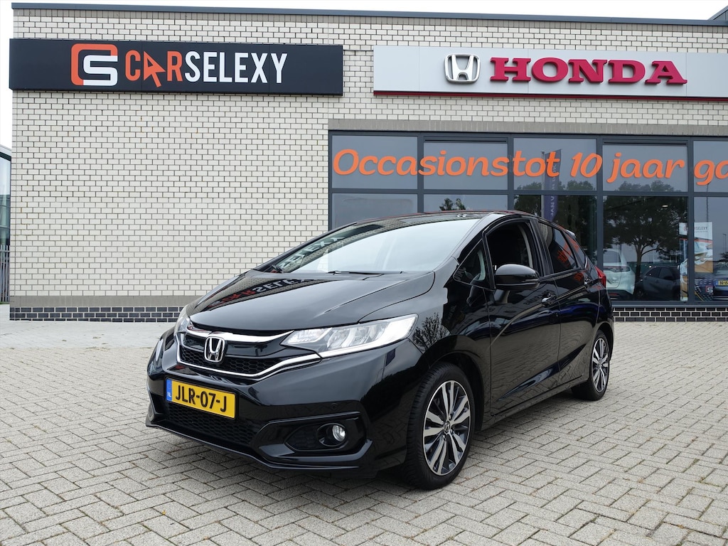 Honda Jazz 1.3 i-VTEC 102pk CVT Elegance + 4 Seizoenenbanden en Verlichte Instaplijsten en Spoiler en Groot Navigatiesysteem