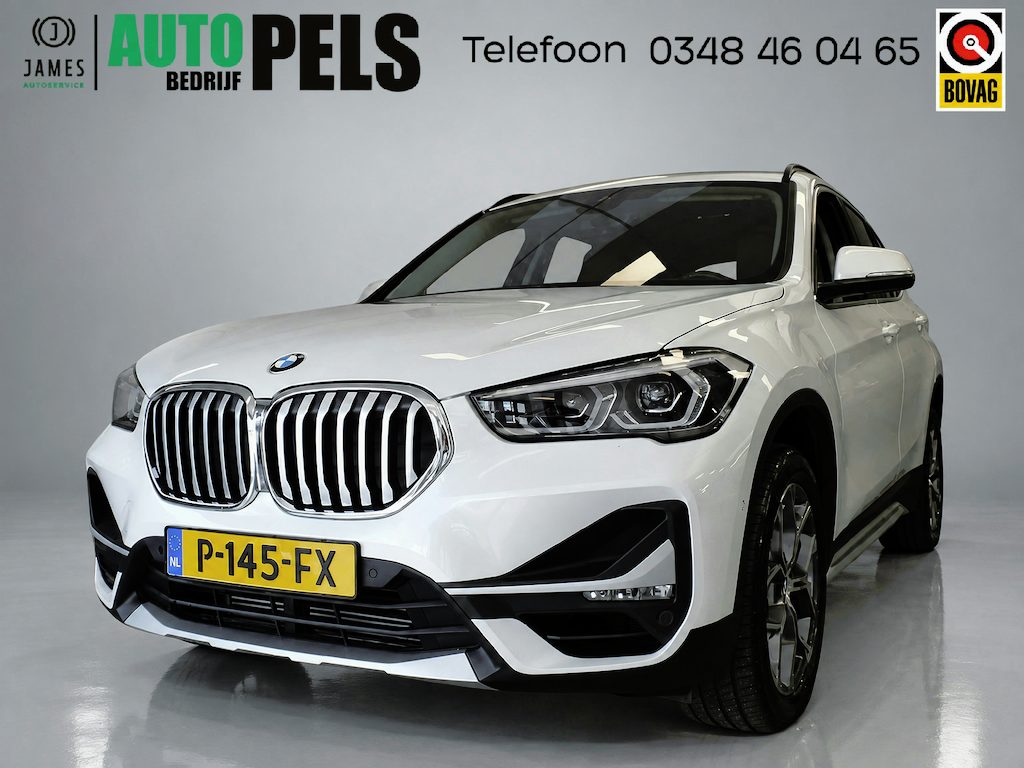 BMW X1 sDrive20i 180pk, Business Edition Automaat, Navigatie Achteruitrijcamera, Cruis controle, Clima controle, Volledige lederen bekleding, Elek stoel, Elek achterklep, Xenon verlichting, Pdc V/A, Lm velgen 18'', Nederlandse auto, 79.000km! Bovag afleverpakket 695,-
