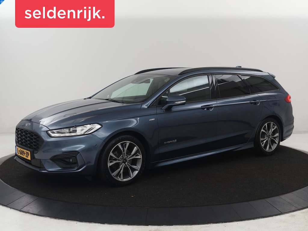Ford Mondeo Wagon 2.0 IVCT HEV Vignale | Leder/alcantara | Memory | Cruise control | Dodehoek detectie | Stuur/stoel verwarming | Achterbank verwarming | Carplay | Camera | Park assist | Elektrische achterklep