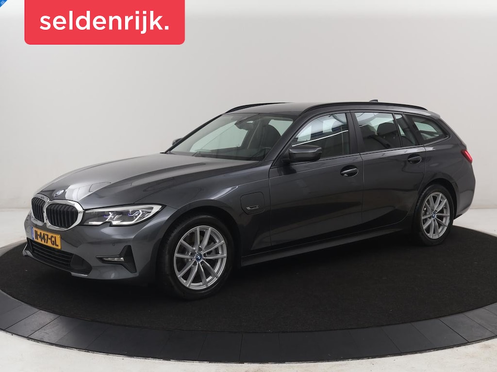 BMW 3-Serie Touring 320e Business Edition Plus | SOH 84,2% | Leder | Cruise control | Stoelverwarming | Climate control | 3 zone klimaat | Navigatie | Bluetooth | Elektrische achterklep | Trekhaak