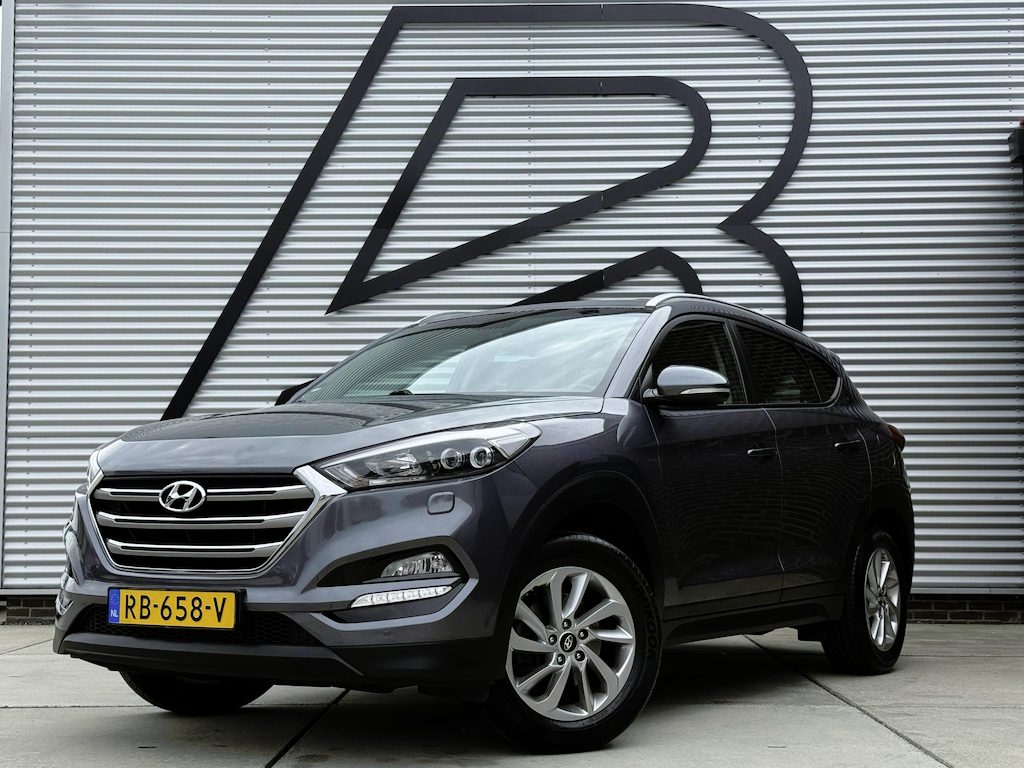 Hyundai Tucson 1.6 GDi Comfort 1e Eigenaar|Navi|Camera|Clima|Stoelverwarming|Cruise|Trekhaak|Leder|6-bak|Nieuwe APK bij Aflevering
