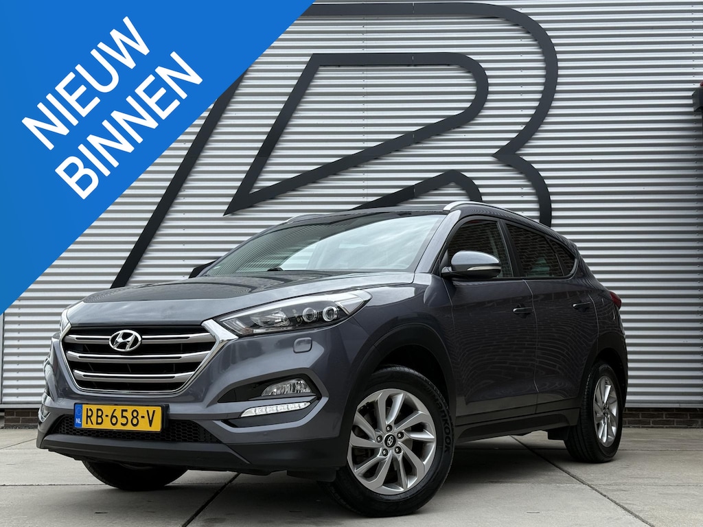 Hyundai Tucson 1.6 GDi Comfort 1e Eigenaar|Navi|Camera|Clima|Stoelverwarming|Cruise|Trekhaak|Leder|6-bak|Nieuwe APK bij Aflevering