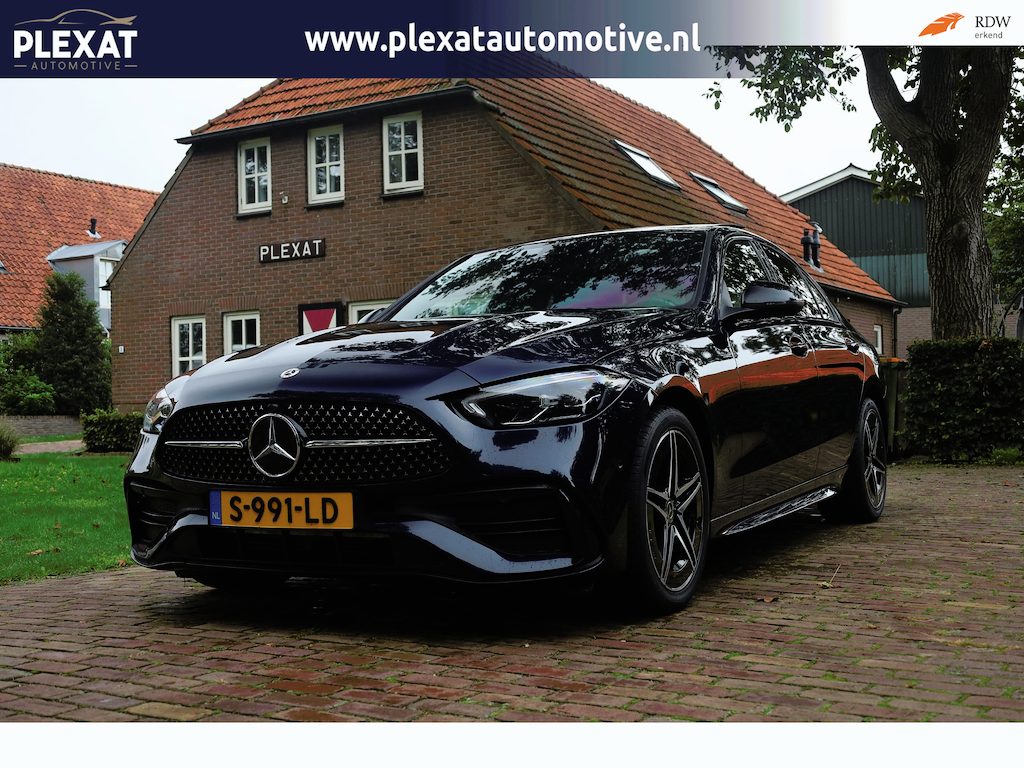 Mercedes-Benz C-klasse 300 e AMG Line Limited Aut. | AMG-Pakket | Panorama | Luxe leder | Stoelverwarming | Carbon | Lederen Dash