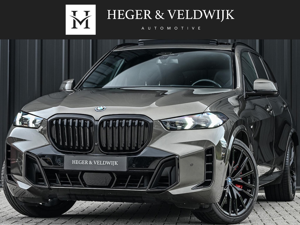 BMW X5 xDrive50e M-Sport Pro | Panoramadak | Achterasbesturing | Massage + Ventilatie | Sky Lounge | 360 Camera | Active Cruise | Harman/Kardon | Iconic Glow | BMW Gesture Control | HUD | Soft Close | Luchtvering | Trekhaak |