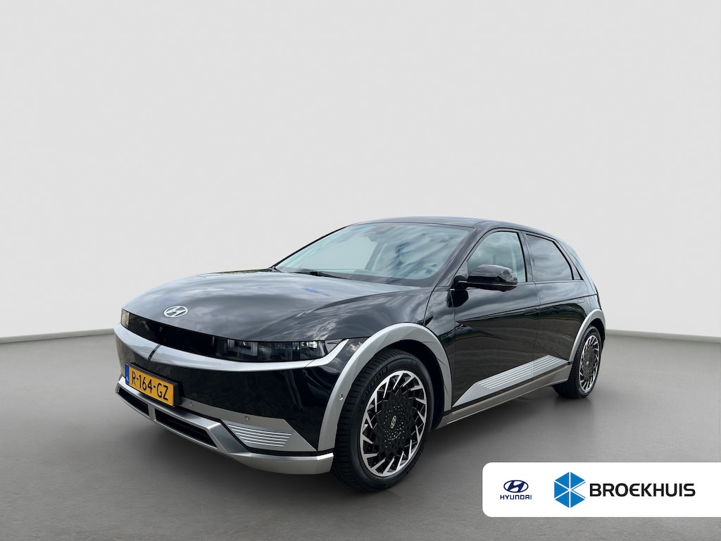 Hyundai Ioniq 5 Lounge AWD 73kWh 305pk | SOH 100% | Carplay | Adaptive cruise controle | 360 graden camera | Elektrische achterklep | Dodehoek detectie | Bestuurdersstoel met geheugen | Head-up display | 20'' Velgen | Warmtepomp | Stoelventilatie | Stuurverwarming