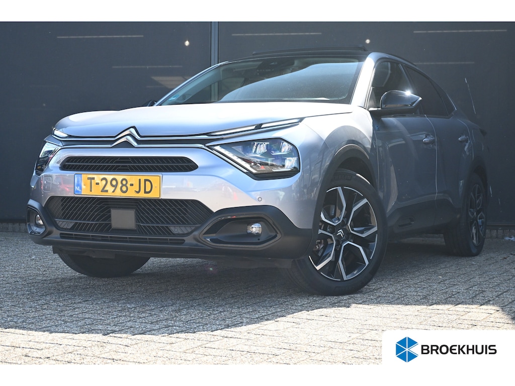 Citroën E-C4X ë-C4 X Shine 50 kWh 97,7%SOH! 3 Fase | Schuif-/Kanteldak | Navigatie | Leder | HUD | Stoel/Stuurverwarming | !!