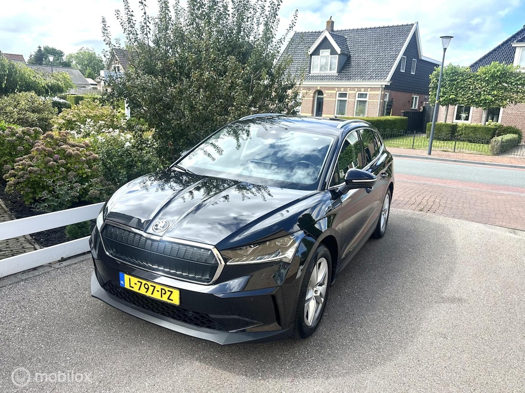 Skoda Enyaq iV 80 SOH 92% CARPLAY WEGKLAPBARE TREKHAAK STUURVERWARMING SFEERVERLICHTING ACHTERUITRIJ CAMERA GROTE ACCU!!