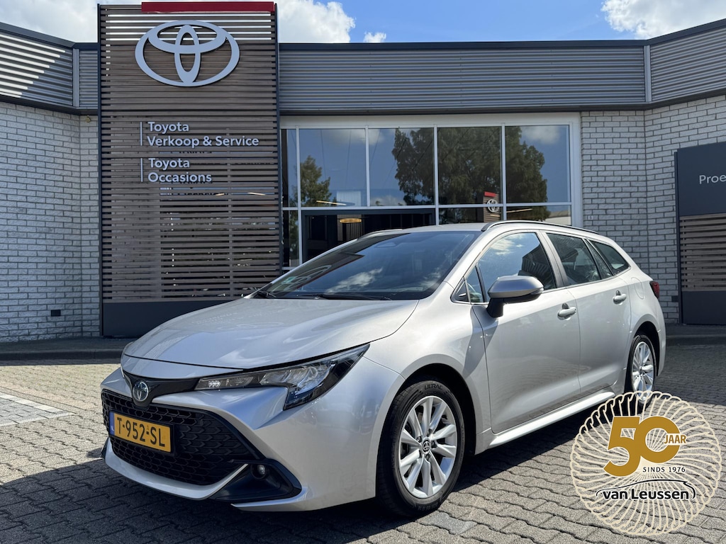 Toyota Corolla Touring Sports Hybrid 140 ACTIVE NL-AUTO NAVI CAMERA APPLE/ANDROID 16'' LM-VELGEN AD-CRUISE CLIMA BLUETOOTH