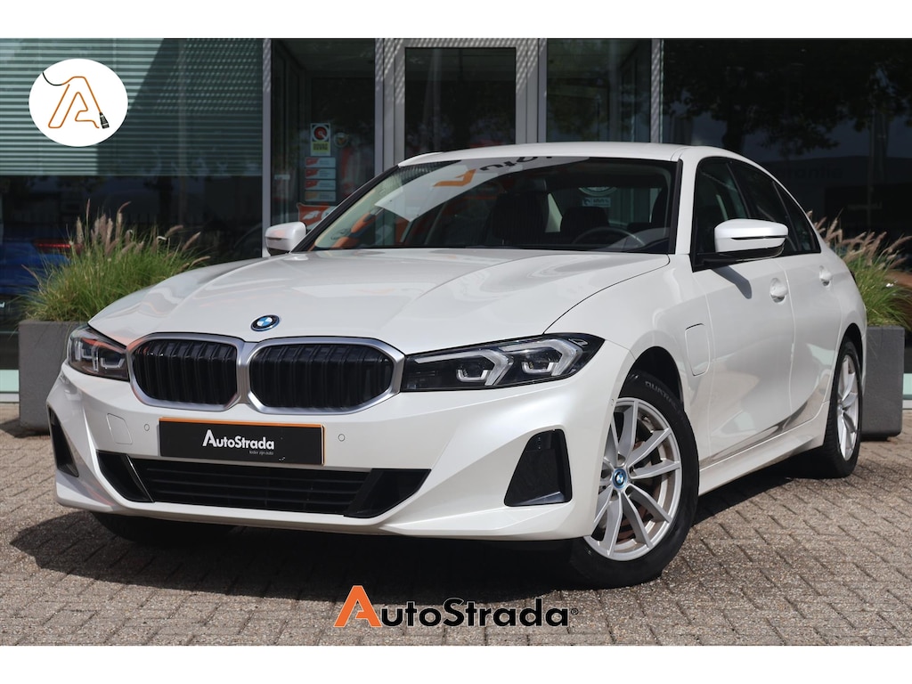BMW 3-Serie (g20) 320e High Executive 204pk | Curved Display I Leder | Camera I Climate I Carplay I DAB I