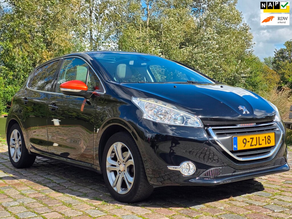 Peugeot 208 1.2 e-VTi Roland Garros Automaat 2e eigenaar dealer onderhouden leerbekeleding stoelverwarming panorama dak cruis con