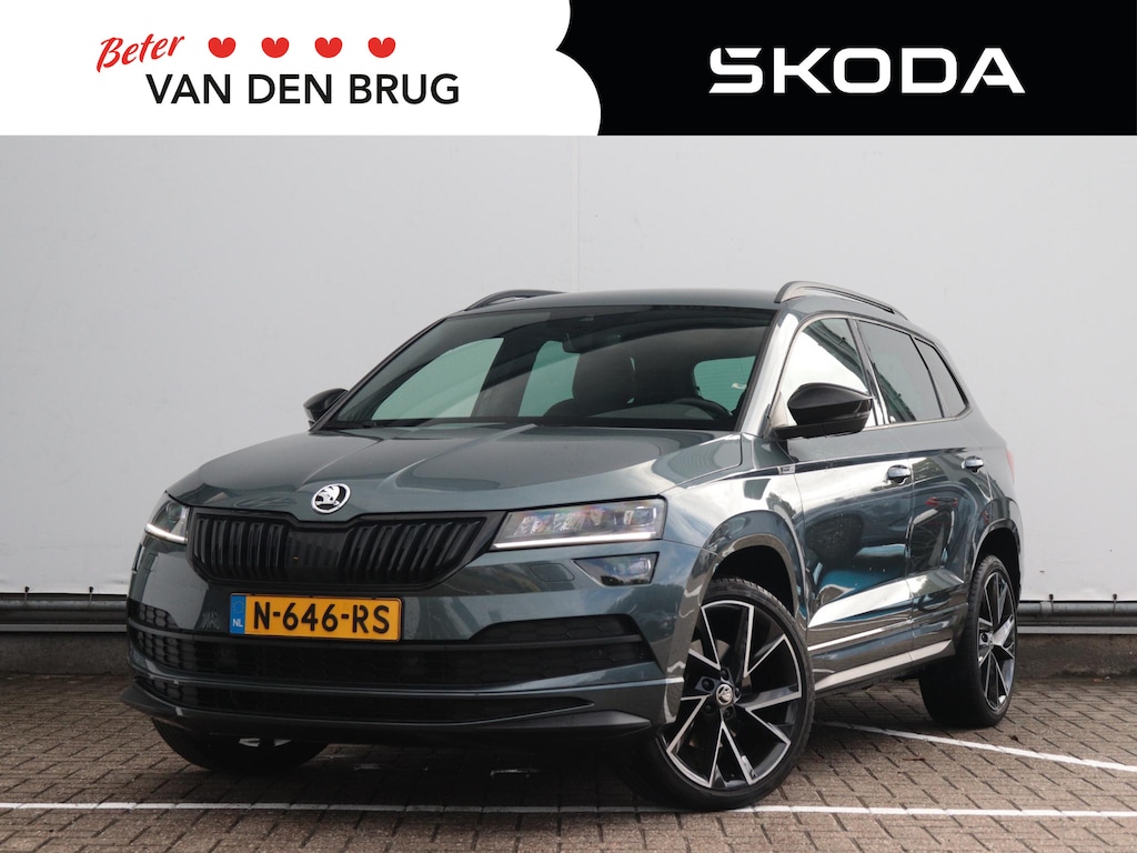 Skoda Karoq 1.5 TSI ACT Sportline Business | Adaptieve Cruise control | Sfeerverlichting | Leer | Stoelverwarming V+A | Keyless | Dodehoek detectie | Elektrische Klep