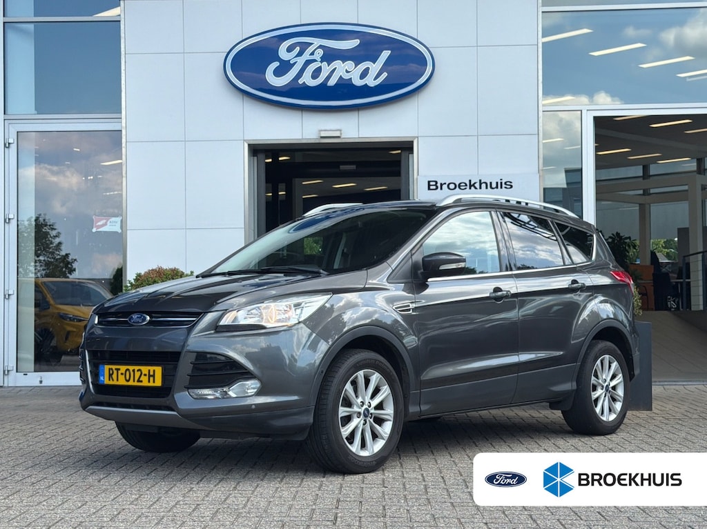Ford Kuga 1.5 Titanium | Trekhaak | Dealer OH! | Cruise Control | Stoelverwarming | Navigatie | Achteruitrijcamera | Airco (automatisch) | Cruise control