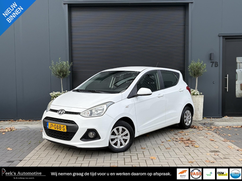 Hyundai i10 1.0i i-Motion Comfort | Climate control | Cruise control | Elektrische ramen | All season banden | NAP | | APK t/m 06-2027!!