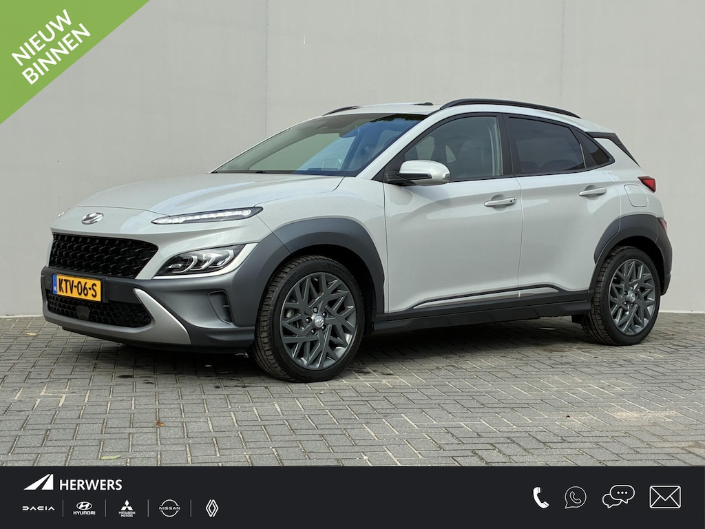 Hyundai Kona 1.6 GDI HEV Premium Sky / Fabrieksgarantie t/m 07-2027 / Schuif/open dak / Stoelverwarming / Lederen bekleding / Achteruitrijcamera / Apple CarPlay/Android Auto / Navigatiesysteem /