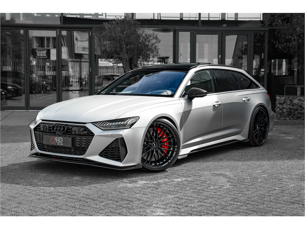 Audi RS6 ABT RS6-S Avant 4.0 TFSI quattro 700pk | Audi Exclusive Floret Silver matte | Carbon optiek | Dynamic plus | Keramische remmen | Design pakket rood | Alcantara hemel | Panorama dak | Assistentiepakket plus | B&O Premium audio | Carbon spiegels | Carbon interieur | HD Matrix Laser LED | Uitgebreid leder pakket | Servosluiting | Memory | Xpel