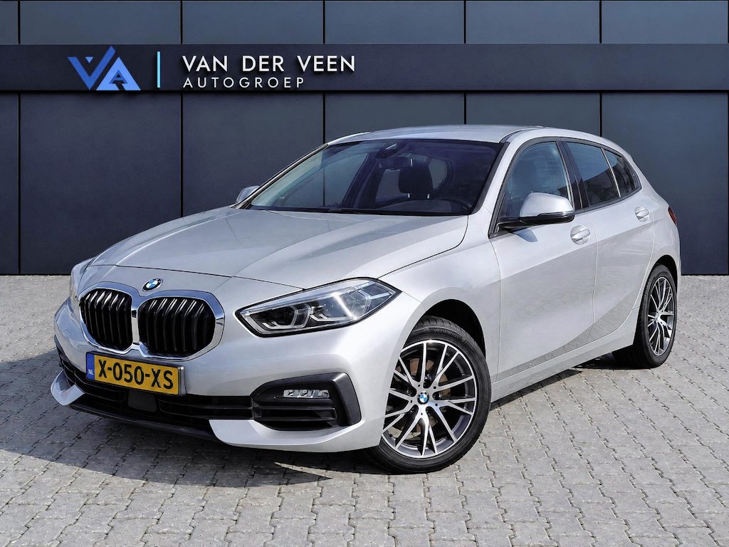 BMW 1-Serie 116i High Executive | Incl. 12 maanden garantie | Stoelverwarming | Apple Carplay & Android Auto | WIFI | Climate Control | Hill Hold | Elektrisch verstelbare stoelen |