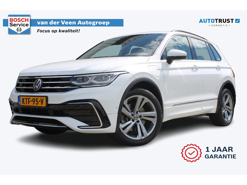 Volkswagen Tiguan 1.4 TSI eHybrid R-Line Business+ | Incl. 12 maanden garantie | SOH 92% | Stoel/stuurverwarming | Parkeercamera | Wegklapbare trekhaak | DAB radio | Apple carplay/Android auto | 100% dealer onderhouden |