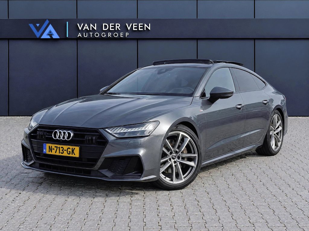 Audi A7 Sportback 55 TFSI quattro Pro Line S | Incl. 12 maanden garantie | Schuif/kantel panorama dak | 360° camera | Head-up display | Wegklapbare trekhaak | Matrix koplampen | Soft close | Memory zetels | Dode hoek detectie | Elektrische achterklep | Bowers & Wilkens | Standkachel |