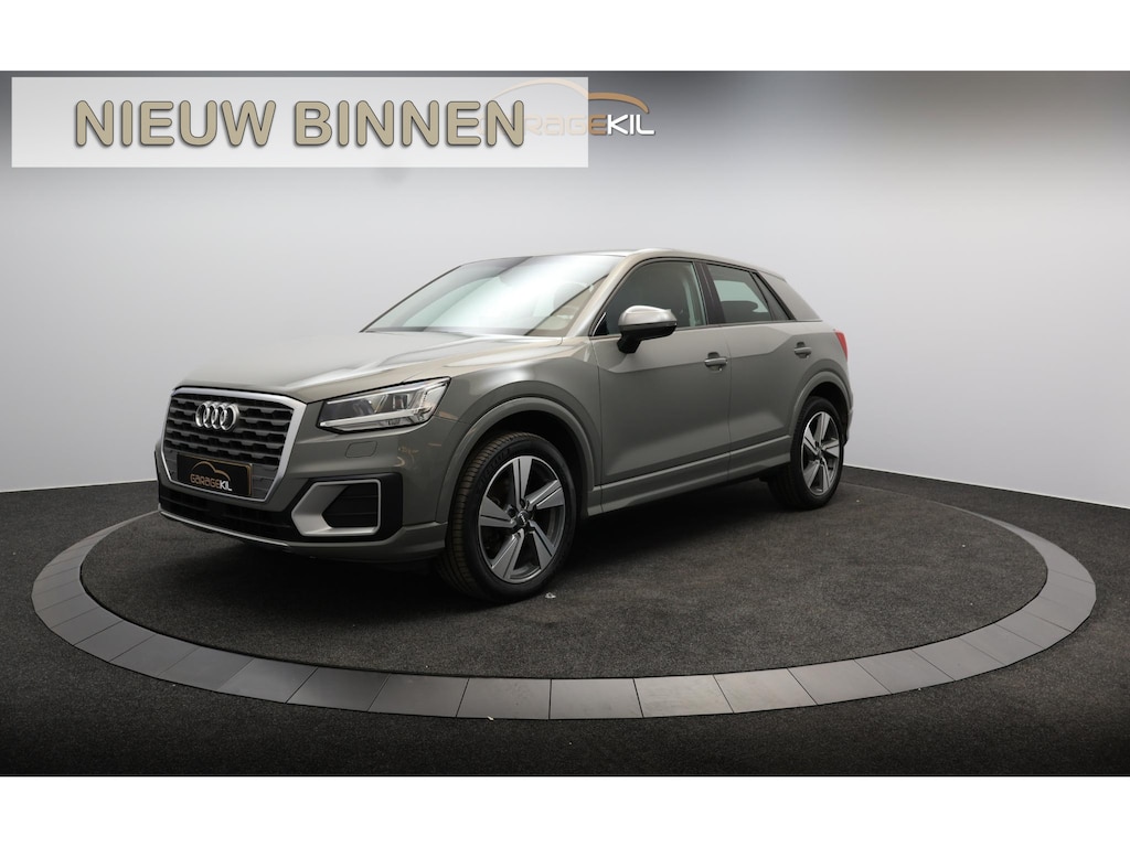 Audi Q2 1.0 TFSI #limited Orig. NL / LED / Trekhaak afn. / 18'' LM velgen / Airco / Nano grijs / PDC /