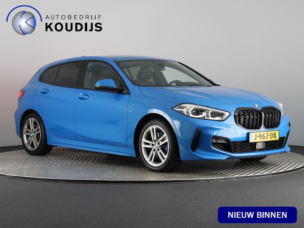 BMW 1-Serie 118i High Executive M-Sport (NL-Auto / Virtual Display / Cruise / Carplay / Sfeerverlichting / Navi)