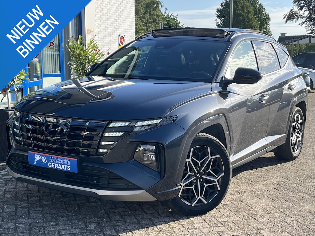 Hyundai Tucson 1.6 T-GDI PHEV N Line Sky 4WD | Trekhaak, Schuifdak, Dealer onderhouden, 1e eigenaar, Adaptieve Cruise, Elektr. kofferklep, Half alcantara/leder, 19 inch!