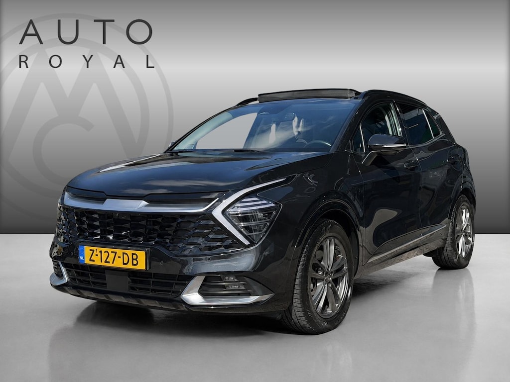Kia Sportage 1.6 T-GDi Hybrid DynamicPlusLine TREK GEWICHT 1650 KG | LEDER | AWD | 360 GRADEN CAMERA | HARMAN/KARDON | ELEKTRISCH VERSTELBARE STOELEN | STOELVERWARMING | STUURVERWARMING | STOELKOELING | PANORAMADAK | NAVIGATIE | LED | DODEHOEK DETECTIE | APPLE CARPLAY / ANDROID AUTO | ADAPTIEVE CRUISECONTROL | FABRIEK GARANTIE 7 JAAR |