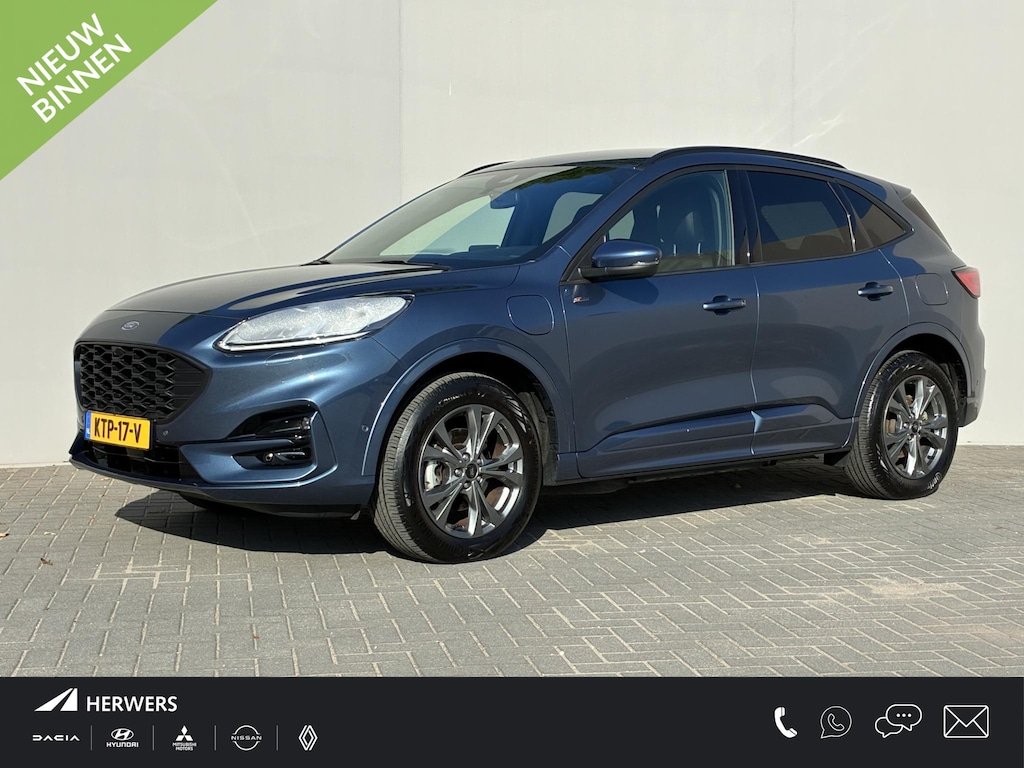 Ford Kuga 2.5 PHEV ST-Line X / Dealer onderhouden / Trekgewicht 1.500 kg / Navigatie / Stuur-, stoel- & achterbankverwarming / Parkeer assistent / Camera 360° / Elektrische stoel & klep / 18" LM wielen / Adaptief cruise control / Apple Carplay/Android Auto /