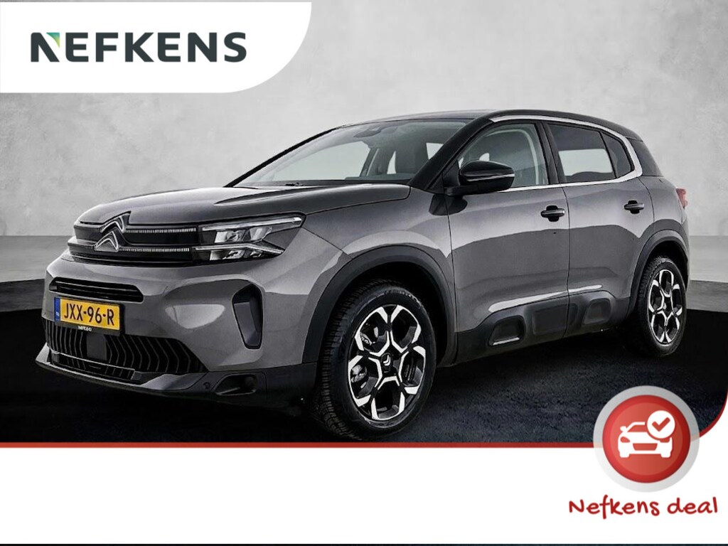 Citroën C5 Aircross SUV Plus Hybrid 145pk Automaat | Navigatie | Achteruitrijcamera | Climate Control | Cruise Control | Parkeersensoren v+a | Keyless | Half lederen comfortstoelen | Stoelverwarming | Led koplampen | Armsteun | Apple Carplay / Android Auto | Adaptief demping systeem | DAB+ radio | Donker getint glas | 18" lichtmetalen velgen |