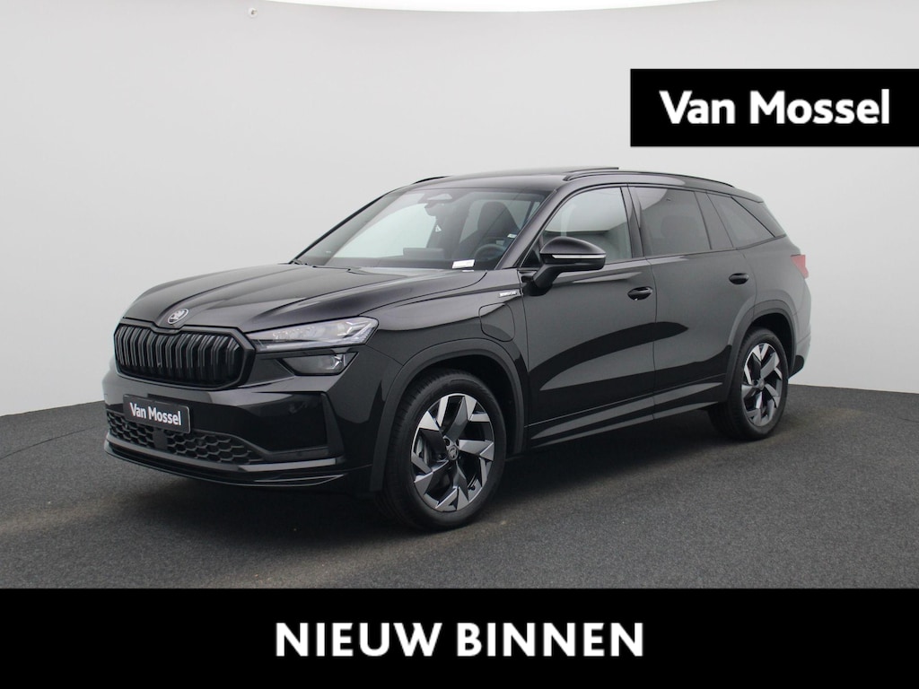 Skoda Kodiaq 1.5 TSI PHEV Sportline Business 204PK | Automaat | Matrix LED Koplampen | Trekhaak | Canton Geluidssysteem | Navigatie | Apple Carplay/Android Auto | Keyless Entry | Achteruitrijcamera | Climate Control | Adaptive Cruise Control | Parkeersensoren | Elektrische achterklep | Privacy Glass | Stoelverwarming | Lichtmetalen velgen | €2000 inruilpremie! |Direct leverbaar! |