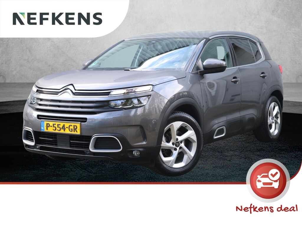 Citroën C5 Aircross SUV Business 130pk | Navigatie | Achteruitrijcamera | Climate Control | Cruise Control | Parkeersensoren v+a | Dodehoeksensor | Led koplampen | Armsteun | Apple Carplay / Android Auto | Bluetooth | DAB+ radio | Volledig digitaal instrumentenpaneel | Multifunctioneel lederen stuurwiel | Donker getint glas | 18" lichtmetalen velgen |