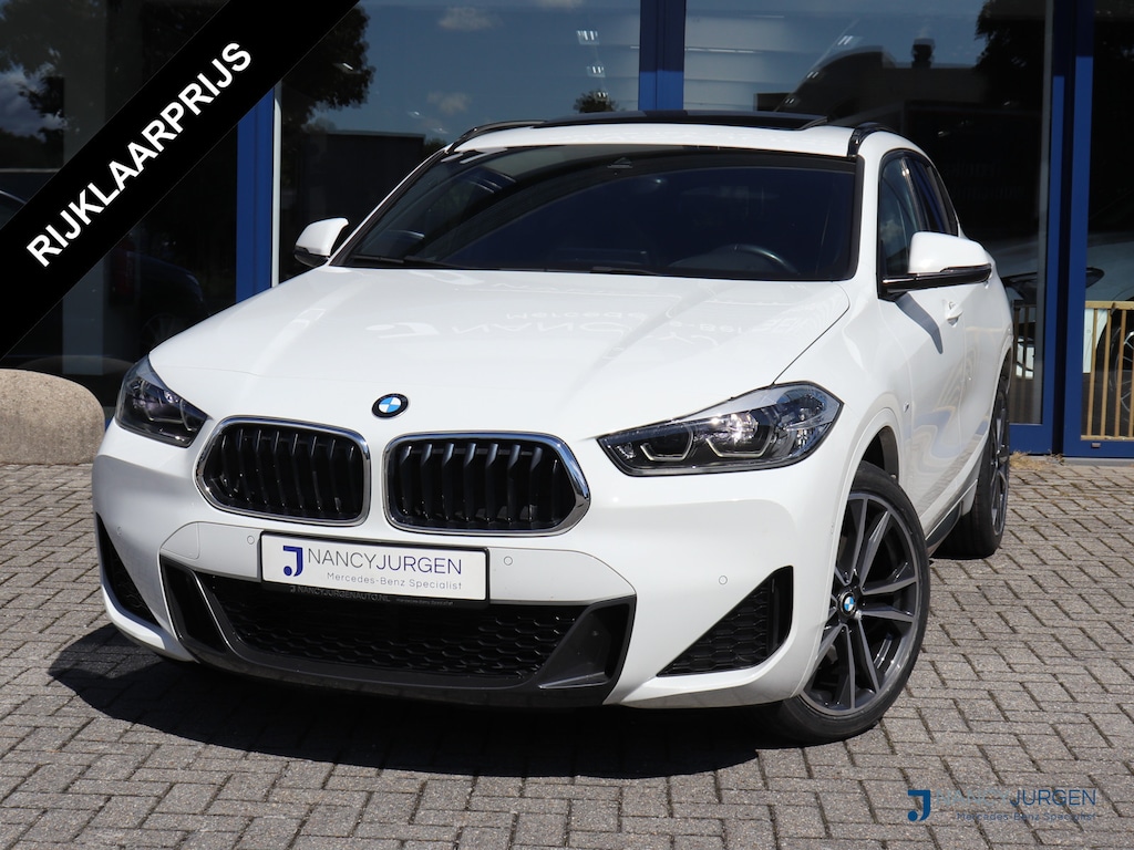 BMW X2 sDrive20i High Executive Edition | M-Pakket | Cruise Control met Remfunctie | Pano | Stoelverwarming | Leer | Elek. Kofferklep | Draadloos Opladen | Privacy Glas | Navi | HiFi-Audio | LED | DAB | Performance Control | M Sport-Chassis
